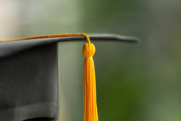 istock Close up Black graduation cap and yellow tassel 1310917441