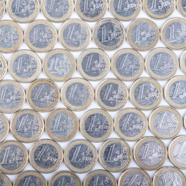 istock one euro coins in a row as background 1310922166