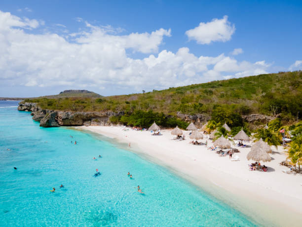 Cas Abou Beach on the caribbean island of Curacao, Playa Cas Abou in Curacao Caribbean Cas Abou Beach on the caribbean island of Curacao, Playa Cas Abou in Curacao Caribbean tropical white beach with blue ocean willemstad stock pictures, royalty-free photos & images