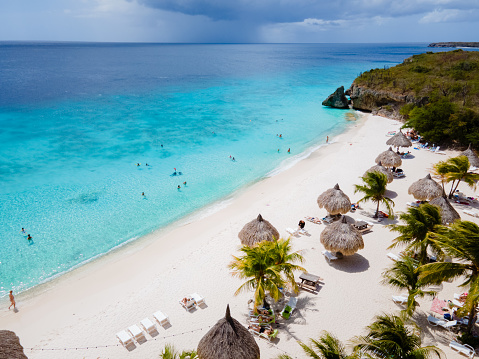 Cas Abou Beach on the caribbean island of Curacao, Playa Cas Abou in Curacao Caribbean tropical white beach with blue ocean