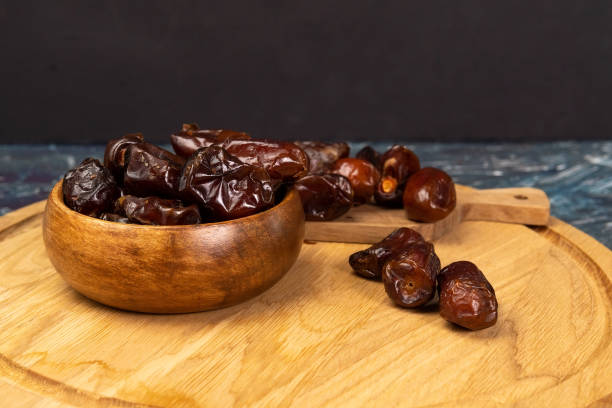 istock Kurma is sweet dried dates, a common dish when Ramadan. copy space 1310929609