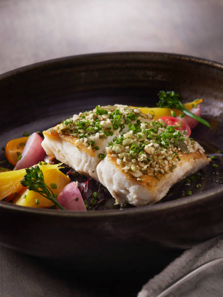 istock Pan Seared Halibut with Pumpkin Seed Gremolata 1310931480
