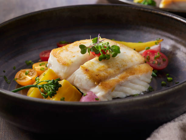 Pan Seared Halibut with Pumpkin Seed Gremolata with a Coconut Curry Sauce