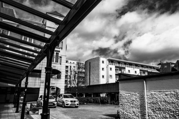 Epsom Surrey, London UK, April 5 2021, Modern Inner City Development of Flats Or Apartments Under A Cloudy Sky