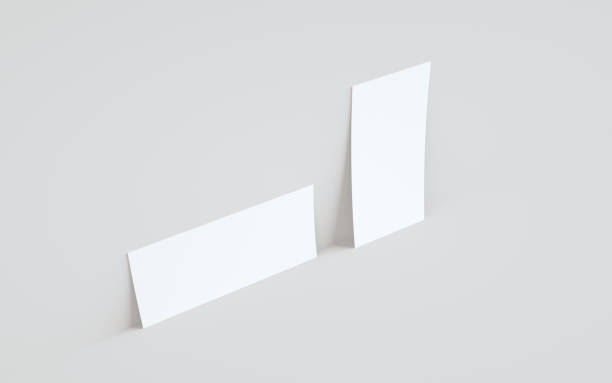 istock DL Flyer / Invitation Mock-Up - Two Flyers Against Wall Background 1310934268