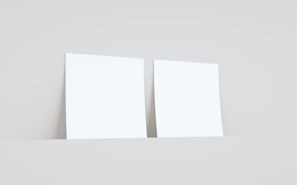 istock Square Flyer Mock-Up - Two Flyers Against Wall Background 1310934272