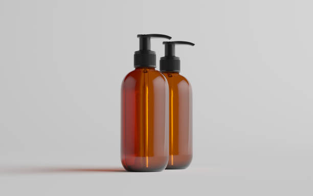 istock Amber Glass Pump Bottle Mock-Up - Liquid Soap, Shampoo Dispenser - Two Bottles 1310934368