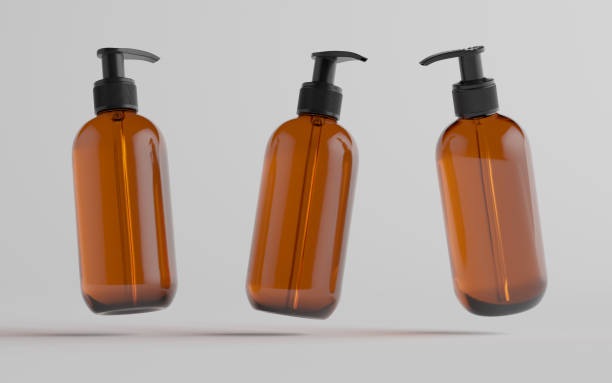 istock Amber Glass Pump Bottle Mock-Up - Liquid Soap, Shampoo Dispenser - Three Bottles 1310934374
