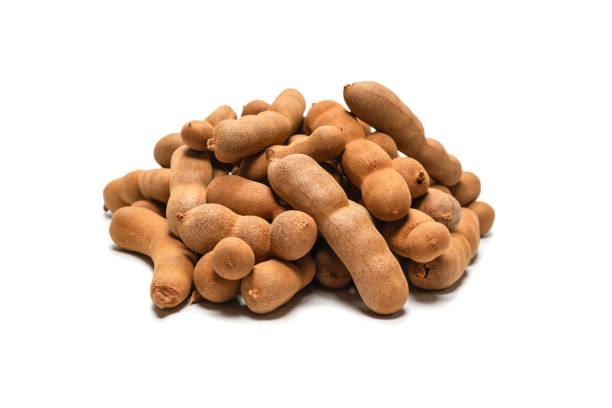 istock Sweet tamarind isolated on white background. 1310935047