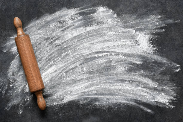istock Flour on the table. The process of cooking on the kitchen table, baking. 1310936496