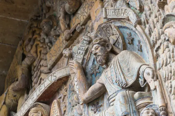Detail of the reliefs of the portico of the Abbey of Sainte-Foy, in Conques (France)