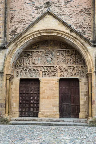 Romanesque tympanum of the Abbey of Santa Fe, in Conques (France)