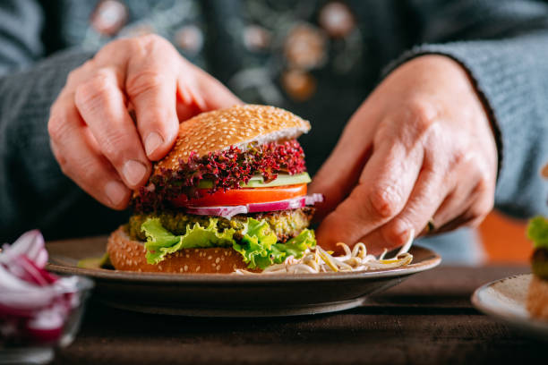 istock She's Preparing a Vegan Burger 1310943576