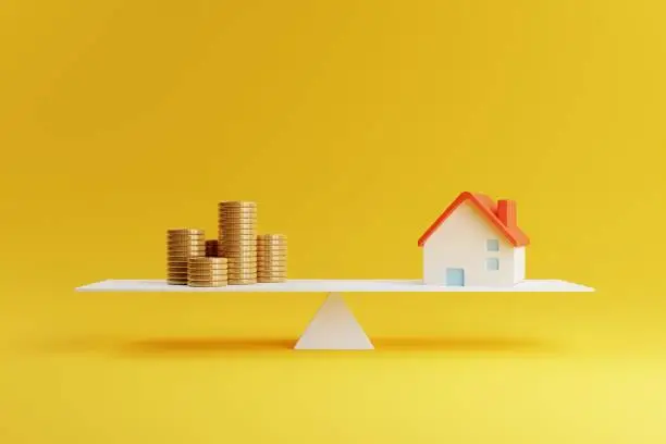 Photo of House and coin on balancing scale on yellow background. Real estate business mortgage investment and financial loan concept. Money saving and cashflow theme. 3D illustration rendering graphic design