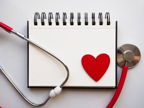 istock Notebook with a drawing in the shape of a heart 1310946209