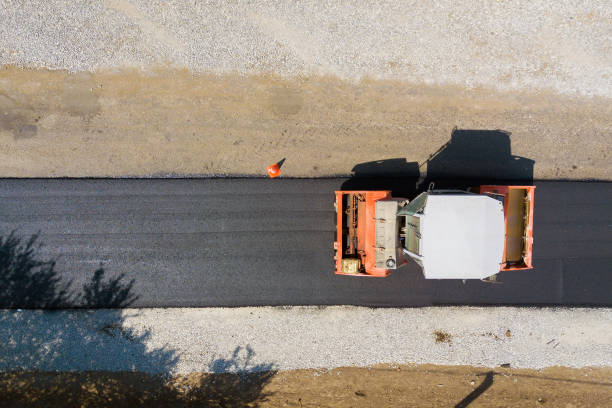 istock Aerial view of new road construction with steam roller machine at work. 1310947782