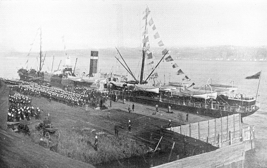 The 2nd (Special Service) Battalion, Royal Canadian Regiment of Infantry boarding the SS Sardinia in Quebec City, Canada leaving for the Second Boer War in South Africa. Vintage etching circa 19th century.