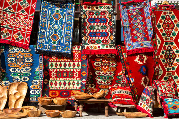 display of textiles in kruje, albania - carpet rug persian rug persian culture imagens e fotografias de stock