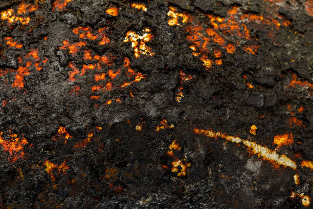 istock Bottom side of a cast iron pan with thicl layer of soot on it. 1310952178
