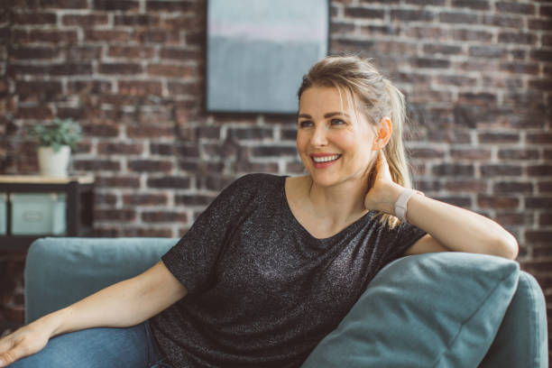 istock Woman relaxing at home 1310952312