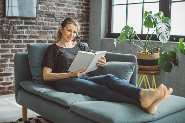 istock Woman relaxing at home 1310952374
