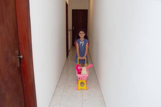 child girl playing on hall