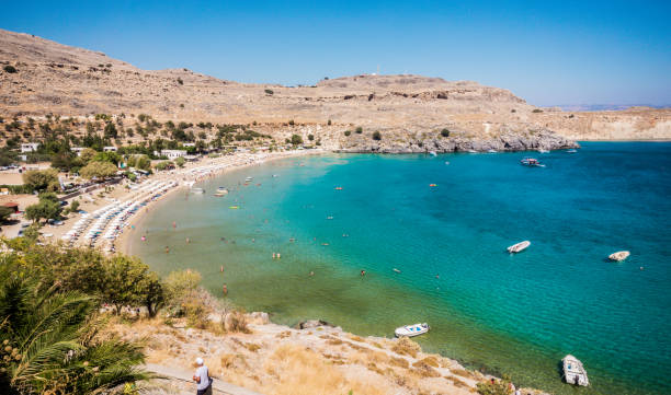 istock Lindos beach with turquoise water in Rhodes, Greece 1310955443