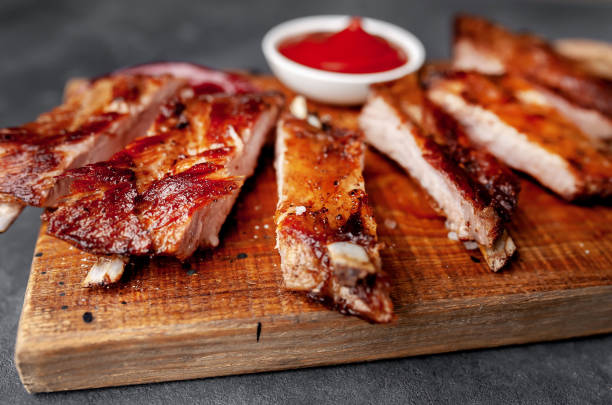 istock grilled pork ribs with spices on a stone background 1310955469