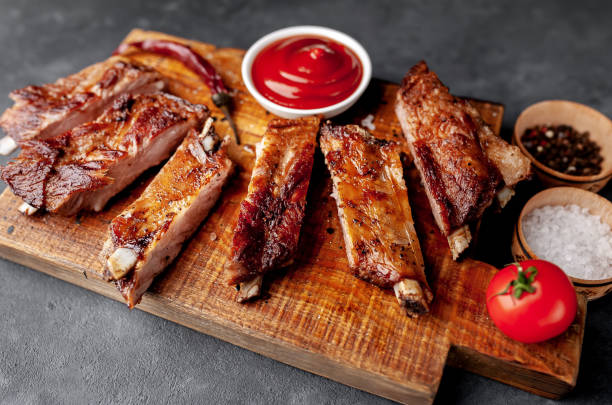istock grilled pork ribs with spices on a stone background 1310955533