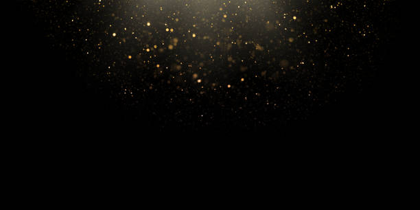 bildbanksillustrationer, clip art samt tecknat material och ikoner med suddiga partiklar och gyllene defokuserade ljus över svart bakgrund - oskarpt fokus