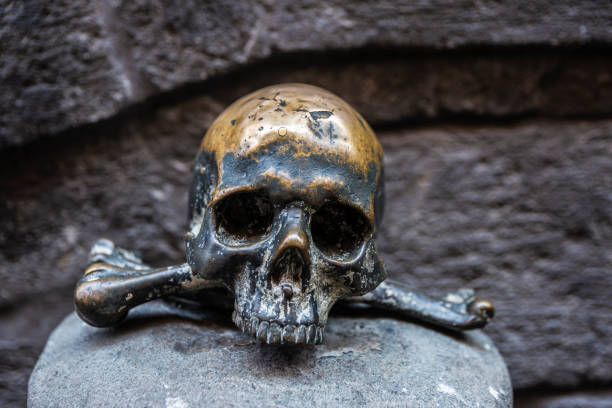 istock Skull and bones sculpture in Naples, Italy 1310959841