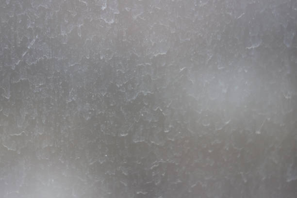 istock Blurred streaks of dust and dirt on the unwashed window. 1310961663