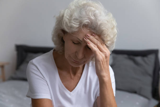 istock Upset senior lady suffering from headache or high blood pressure 1310962027
