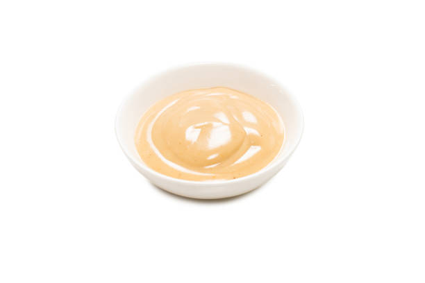 istock Mushroom sauce in a bowl isolated on white background. 1310962264