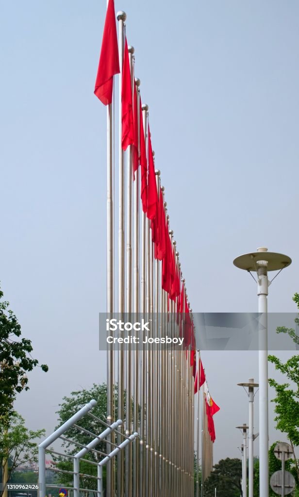 Chinese Flag Array An array of Chinese flags in Beijing, that’s all folks Backgrounds Stock Photo