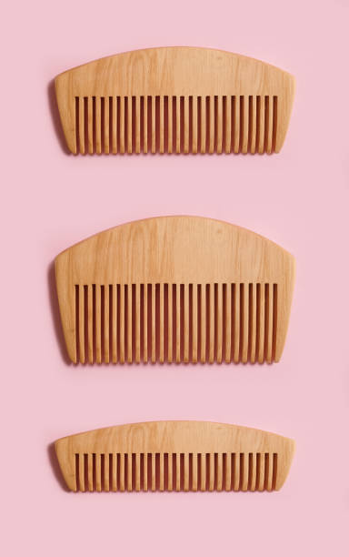 istock wooden comb on a colored background 1310963526