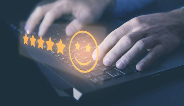 istock Man typing in laptop keyboard. Rating. Customer satisfaction 1310964901