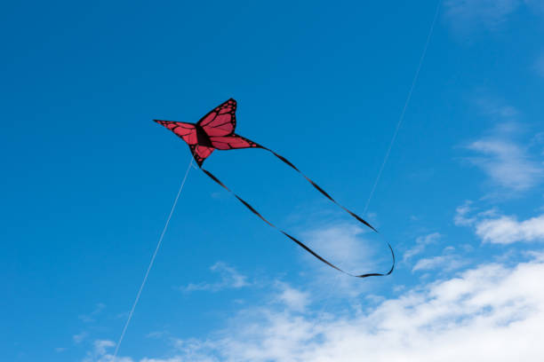 istock Colorful Kites flying over the sky 1310966911