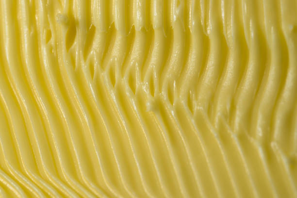 istock Full frame abstract margarine texture made by knife used to spread. 1310972170