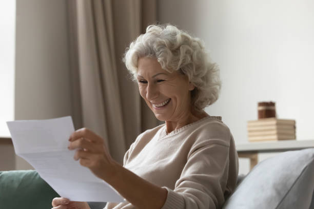 istock Happy elderly 60s excited about good news 1310977430