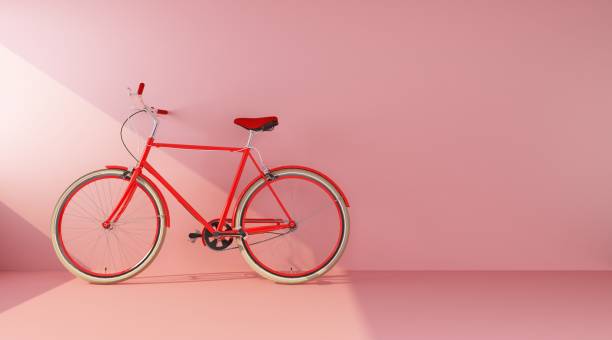 istock red bike on pink wall side view 1310978787