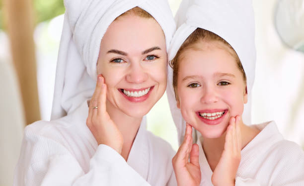 istock Happy mother and daughter after shower 1310978812