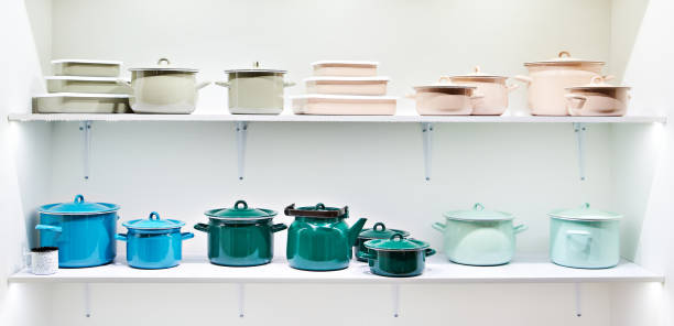 istock Metal enamel pots and teapots in store 1310978865