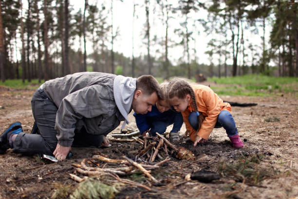 istock Family picnic in the spring forest 1310978906
