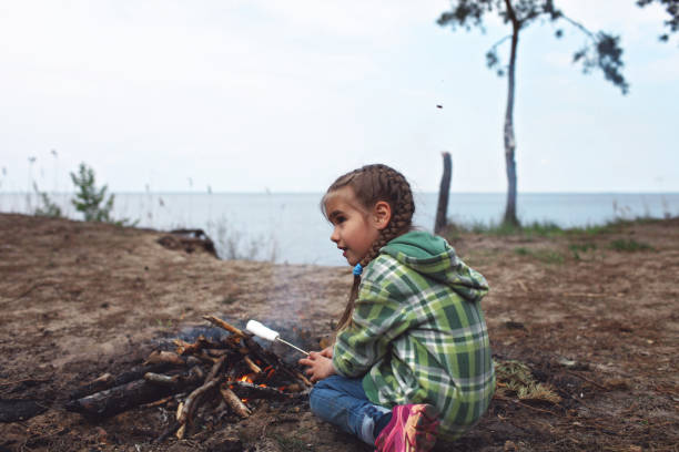 istock Family picnic in the spring forest 1310979273