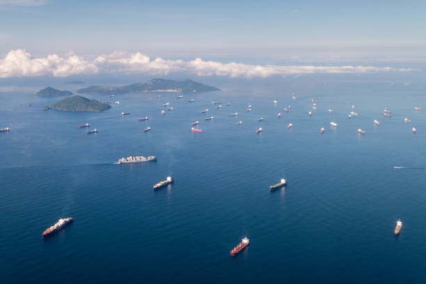 panama city, panama - september 25, 2015: cargo ships waiting to cross panama canal. - containerisation imagens e fotografias de stock