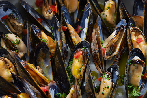Steamed Mussels With a Cherry Vinaigrette, Smoked Paprika, Tomatoes and Fresh Herbs