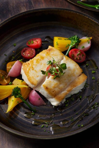 istock Pan Seared Halibut with Dill Oil and Roasted Vegetables 1310981997