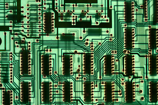 A back lit computer circuit board or motherboard.
