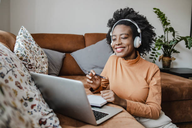 istock Young African American woman attends an online course 1310986368